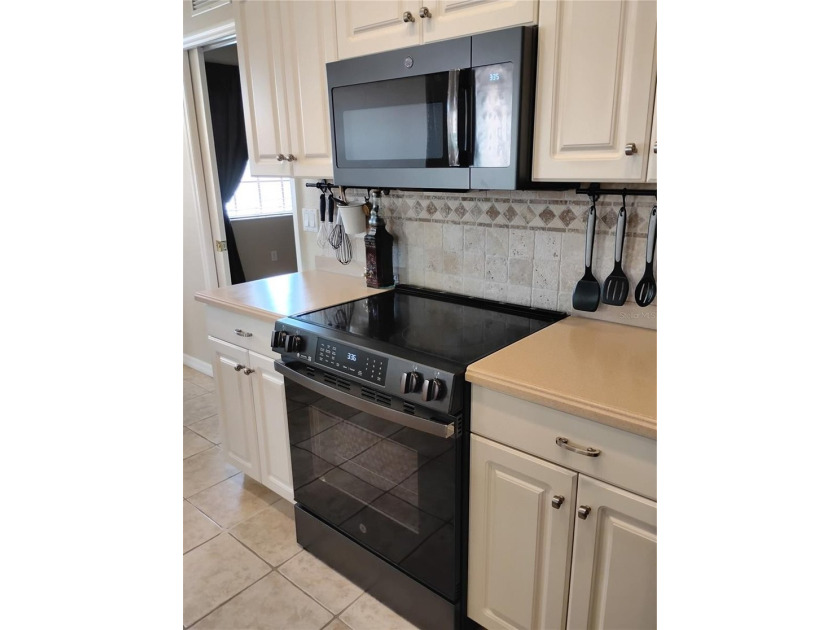WOW!! Check out this beautiful first floor end unit Condo with - photo 36