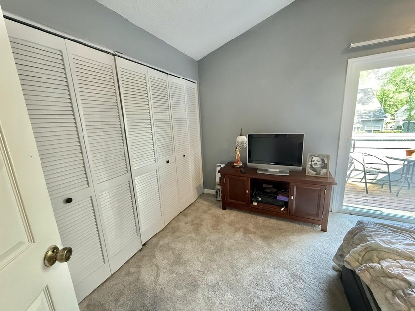 This charming 2 bedroom, 2 bath condo offers a unique and - photo 8