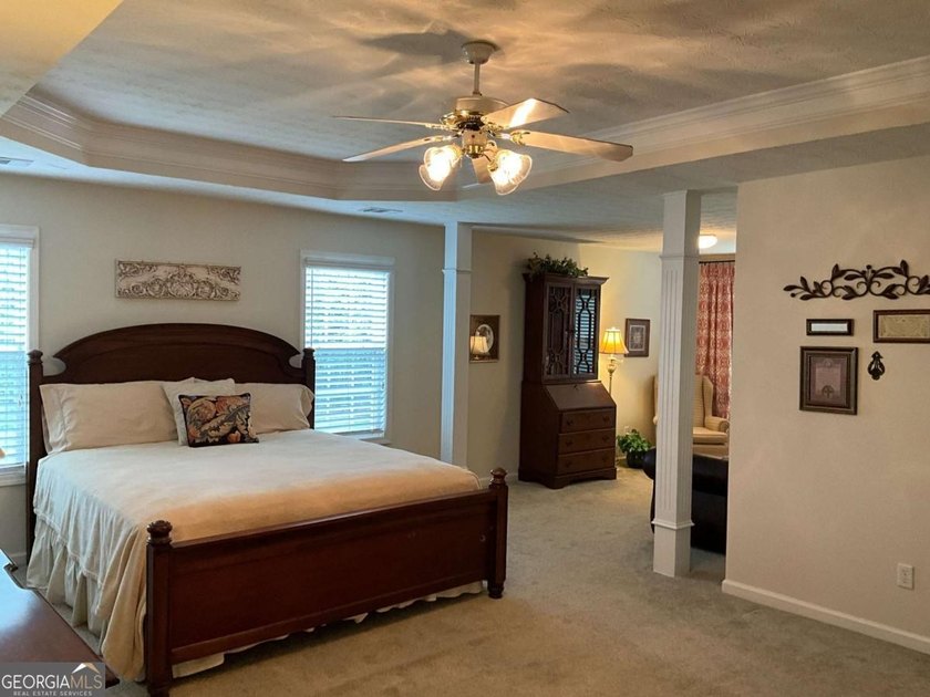 Welcoming large ranch home with 3 car garage in well established - photo 12