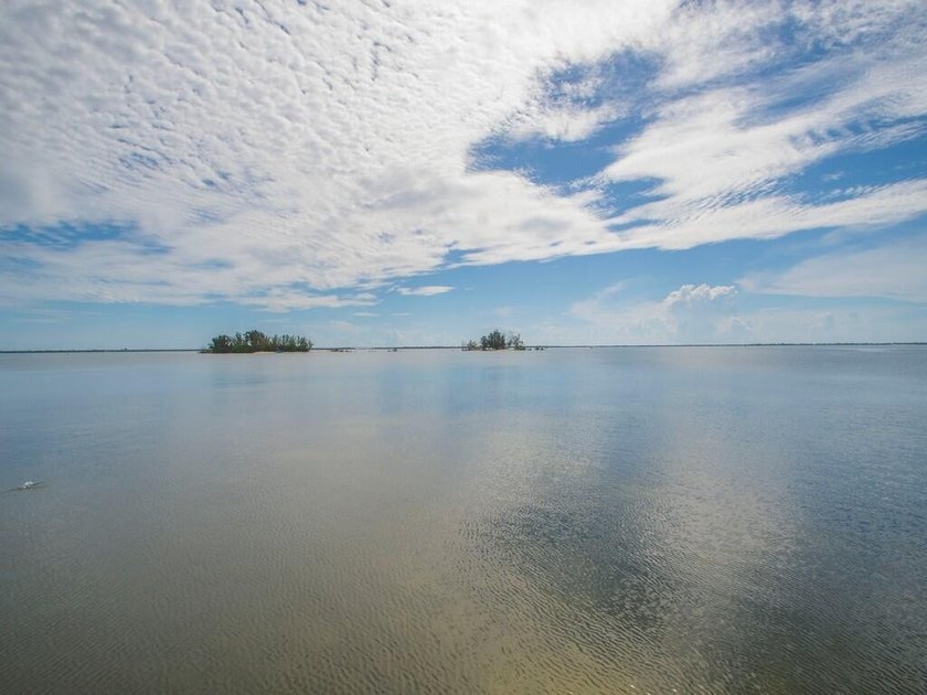 FIRST FLOOR! Enjoy beautiful Indian River Lagoon views from this - photo 44