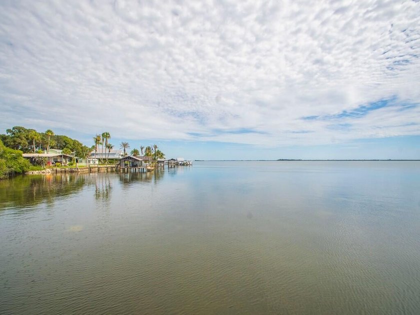 FIRST FLOOR! Enjoy beautiful Indian River Lagoon views from this - photo 45