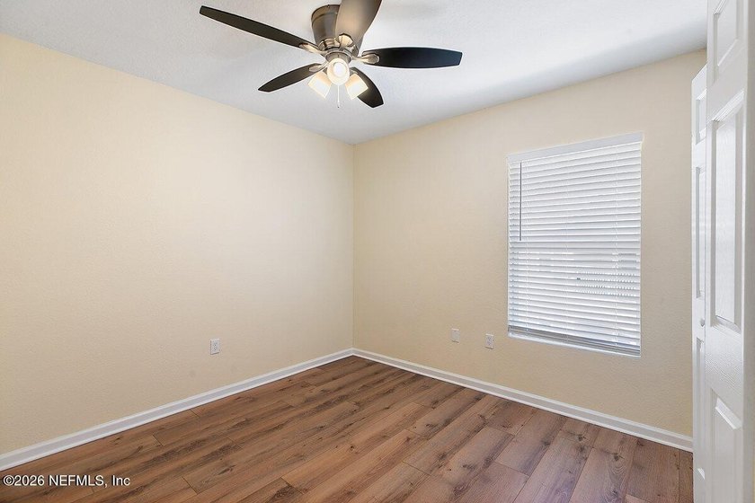 Experience modern living in this fully renovated 3BR/2BA condo - photo 11