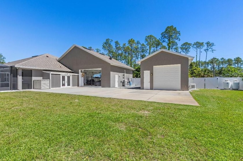 Built in 2022, this custom 4-bedroom, 3-bath home offers modern - photo 11