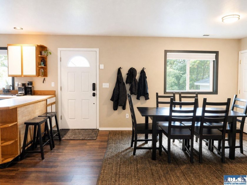 Tucked among mature trees and lovingly maintained, this inviting - photo 35