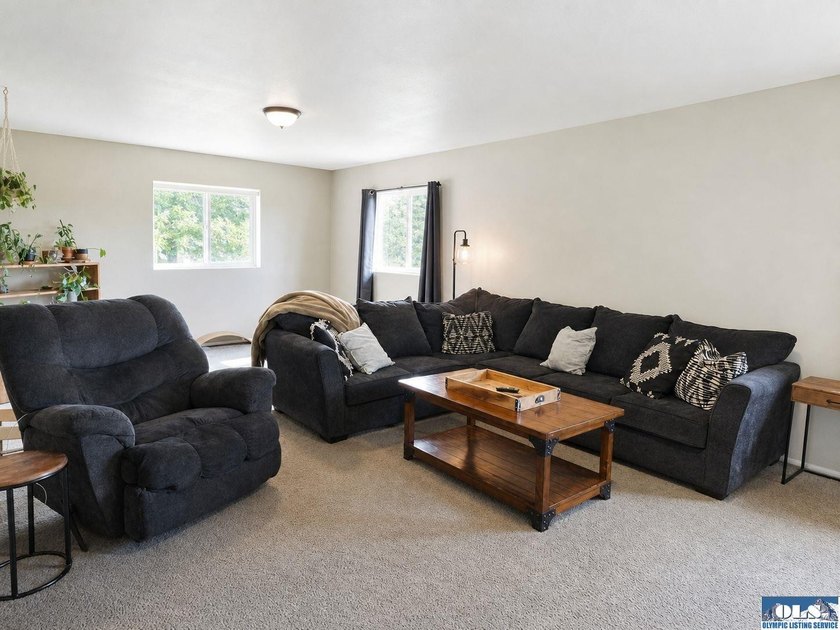 Tucked among mature trees and lovingly maintained, this inviting - photo 46
