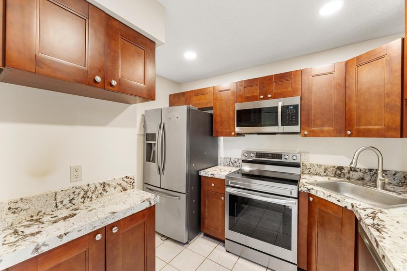 Welcome to this beautifully updated 2 bedroom, 2 bathroom top - photo 10