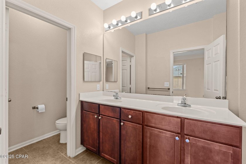 This 3 bedroom 2.5 bath END unit is located in the gated - photo 22