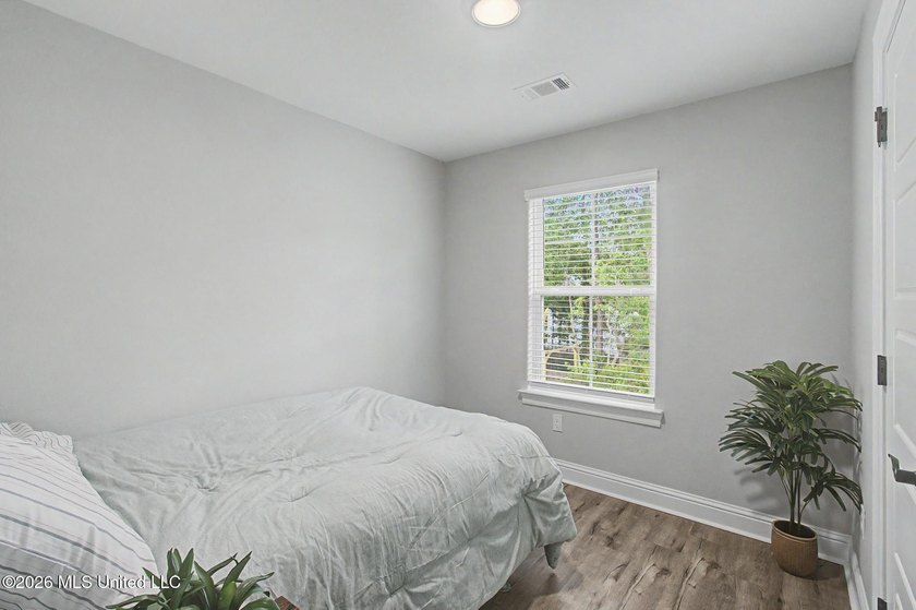 Welcome home to this beautifully crafted 2024 residence that - photo 12