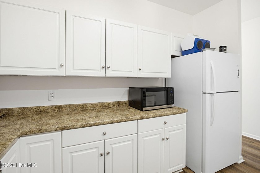 Welcome to 5605 Moss Vine Place -- where coastal charm meets - photo 11
