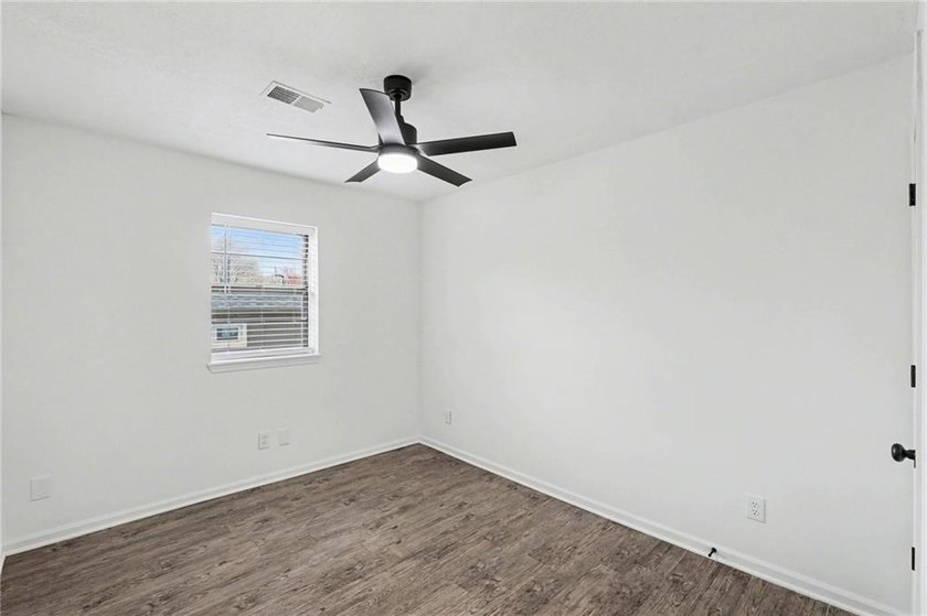 This beautifully updated 1.5-story interior-unit townhome blends - photo 8
