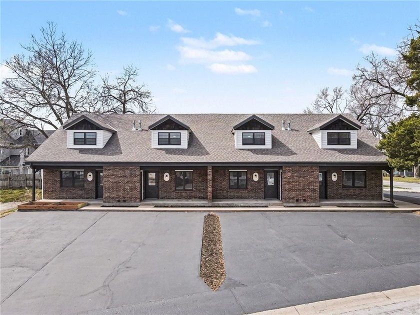 This beautifully updated 1.5-story interior-unit townhome blends - photo 3