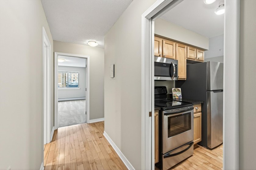 This sunny 1BR/1BA condo includes a heated, underground parking - photo 6