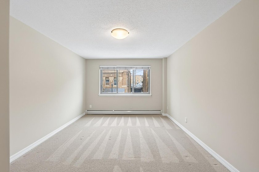 This sunny 1BR/1BA condo includes a heated, underground parking - photo 9