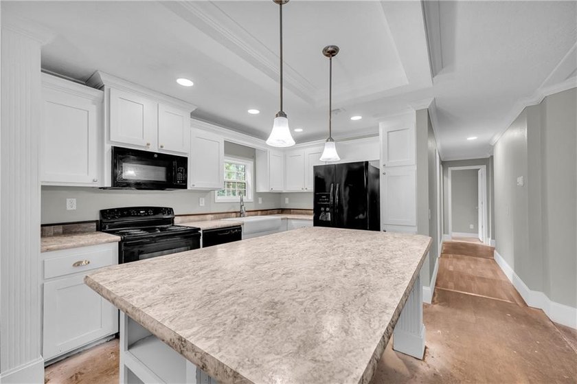 Discover the perfect blend of space, comfort, and country living - photo 13
