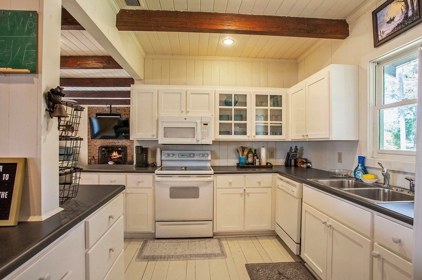 Experience waterfront living at its finest at 64 Poya Point on - photo 14