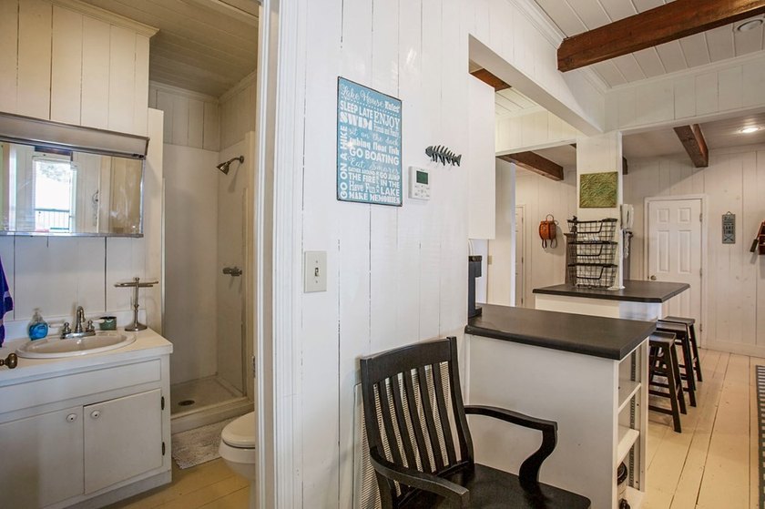 Experience waterfront living at its finest at 64 Poya Point on - photo 17