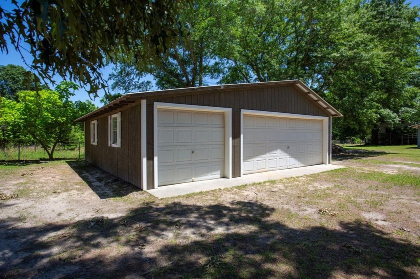 Experience waterfront living at its finest at 64 Poya Point on - photo 24