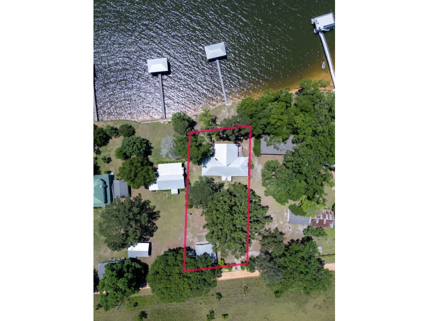 Experience waterfront living at its finest at 64 Poya Point on - photo 25