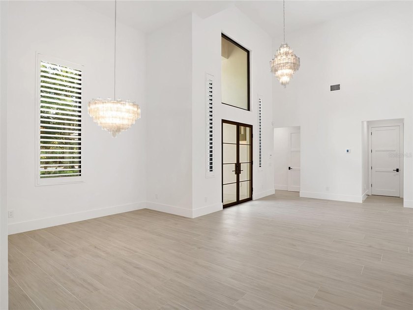 Set within the gates of renowned Isleworth, this beautifully - photo 5