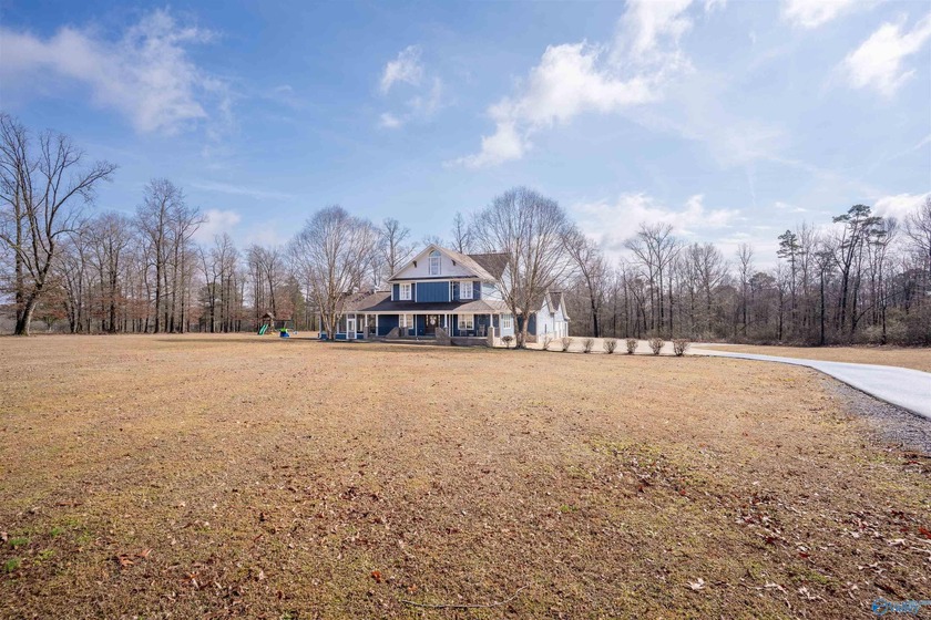 Discover this beautifully remodeled 5,080 sq. ft. home featuring - photo 2