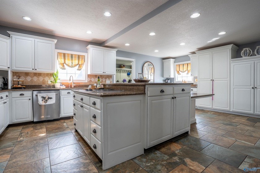 Discover this beautifully remodeled 5,080 sq. ft. home featuring - photo 8