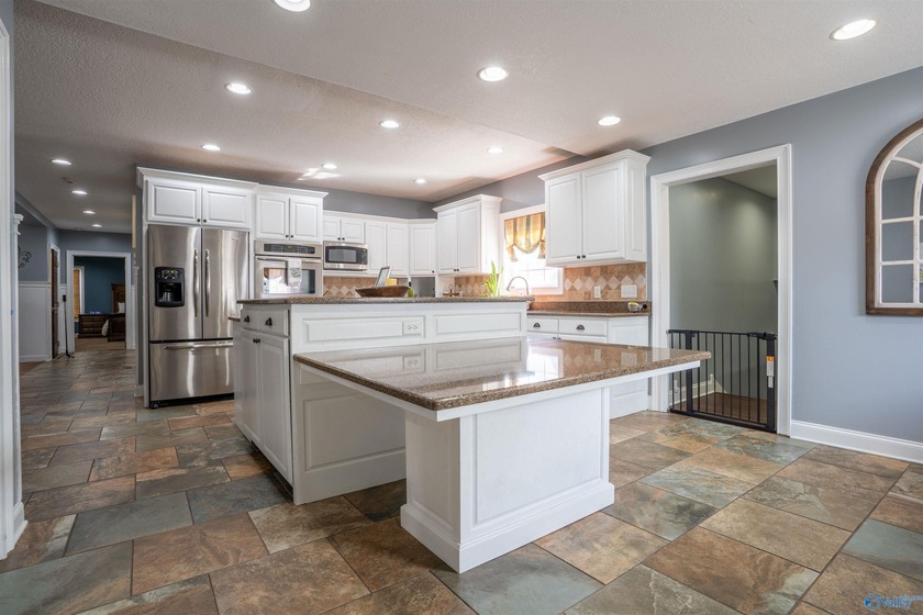Discover this beautifully remodeled 5,080 sq. ft. home featuring - photo 9