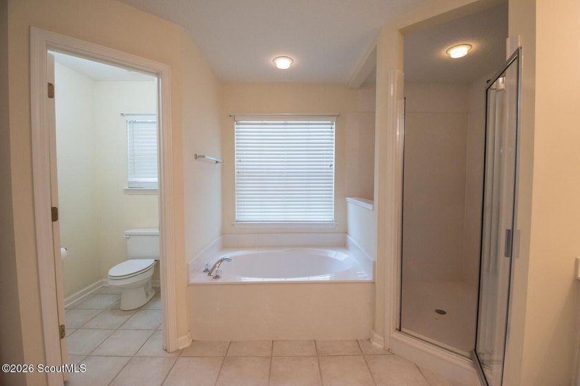 This spacious 5-bedroom, 3-bath home has been freshly painted - photo 11