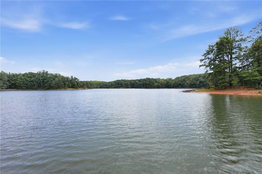 Build your dream lake home on this exceptional waterfront lot in - photo 3
