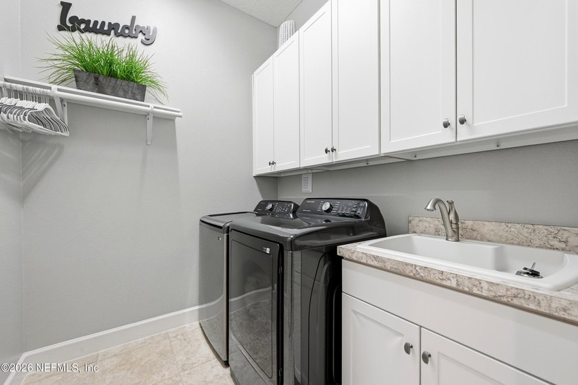 Welcome home to this beautifully maintained 3-bedroom - photo 42