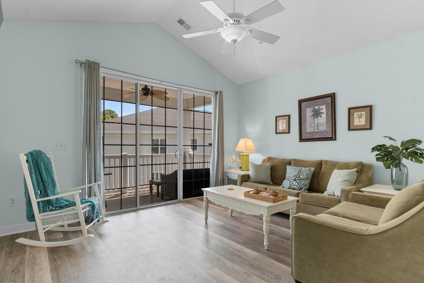 Perched on the top floor as a desirable end unit, this - photo 9