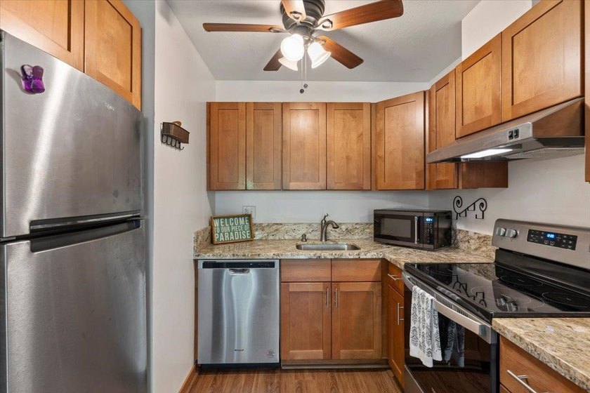 Kanoe Apts is a boutique 18-unit complex in sunny Kihei, with a - photo 10