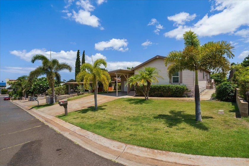 Welcome home to this charming 3-bedroom, 2-bath residence tucked - photo 3