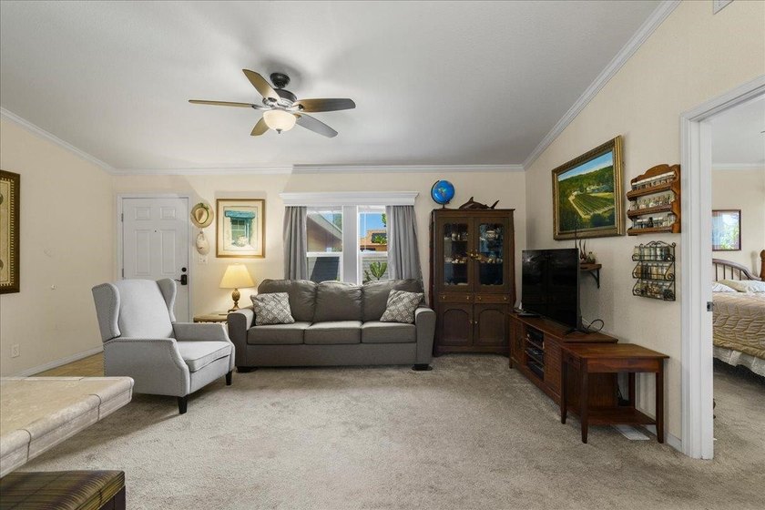 Welcome home to this charming 3-bedroom, 2-bath residence tucked - photo 6