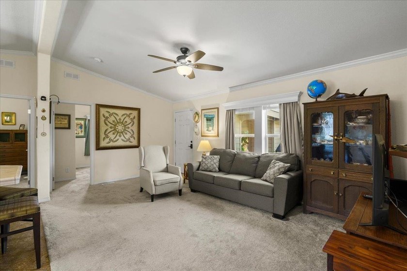 Welcome home to this charming 3-bedroom, 2-bath residence tucked - photo 8