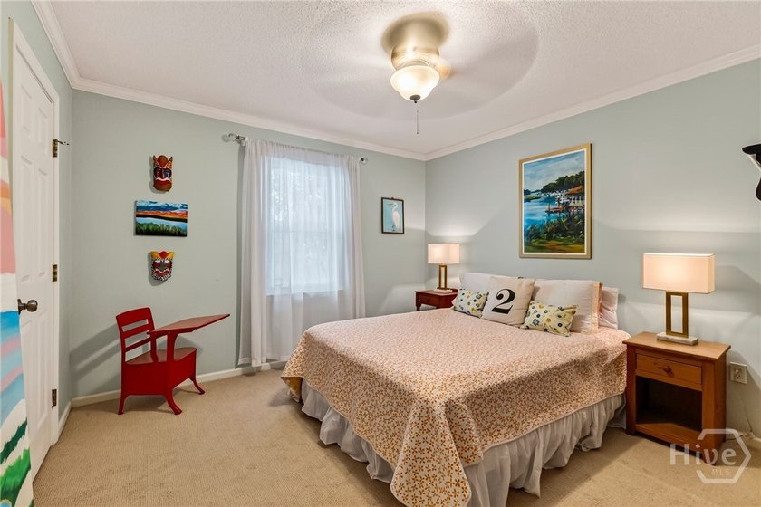 Welcome home to this lovely 4-bedroom, 2-bath residence in the - photo 32