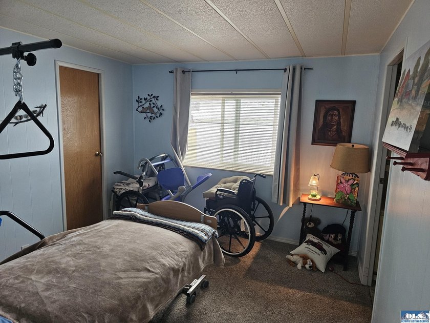 Very well kept home in Juniper Mobile Estates. This home is - photo 14