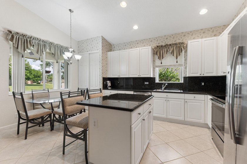 Beautifully maintained home in Baywinds, 55+ featuring serene - photo 14
