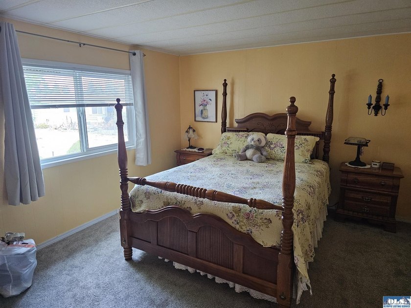Very well kept home in Juniper Mobile Estates. This home is - photo 17