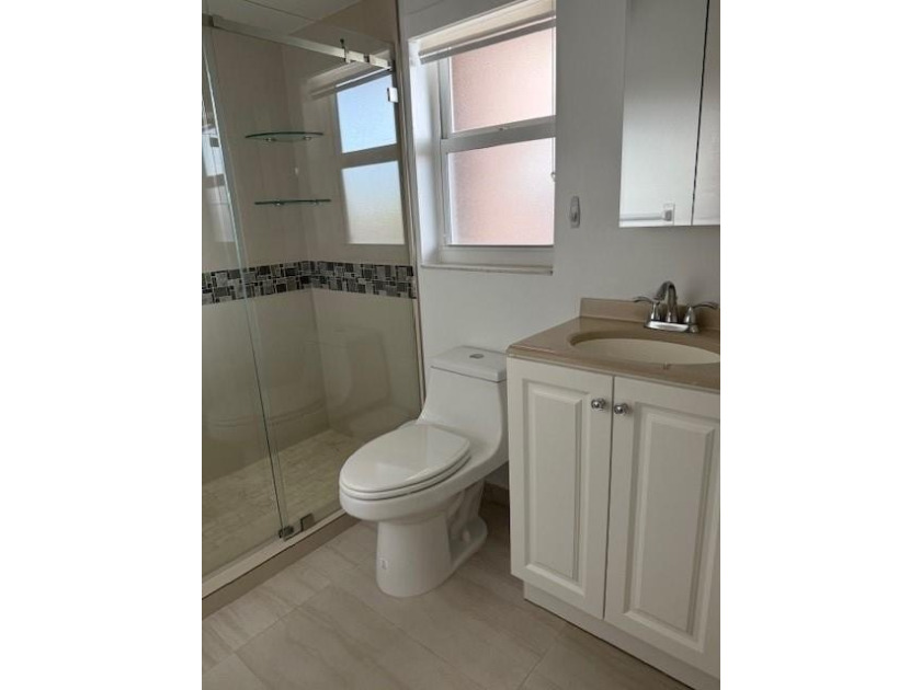 BEAUTIFUL REMODELED UNIT LOCATED IN SUNRISE LAKES PHASE 3, WITH - photo 12