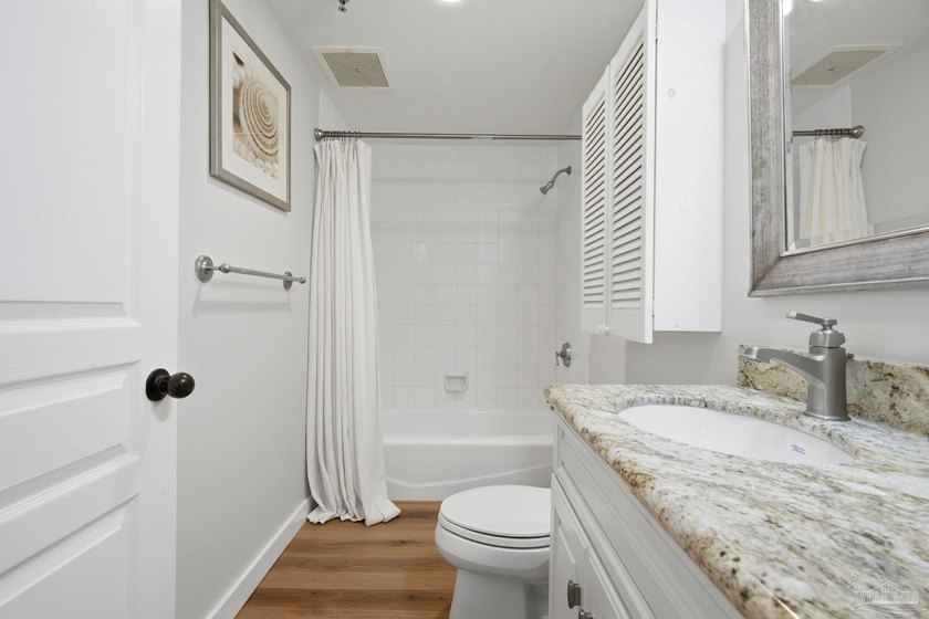 Perched on the 16th floor of Emerald Isle, this beautifully - photo 22
