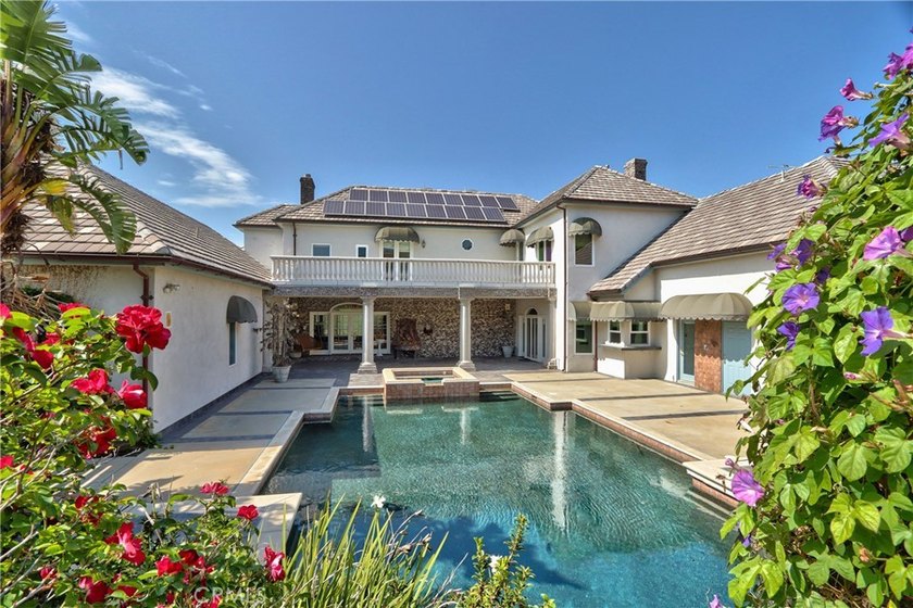 Positioned atop 20.22 fully fenced and gated acres, this stately - photo 9