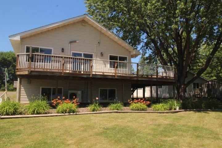 Welcome to Island Lake! This 3-bedroom, 2-bath home with 100 - photo 3