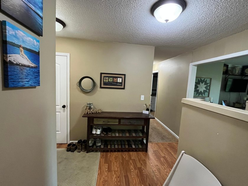 This spacious 5-bed, 3-bath walk-out home on Rainy River offers - photo 5