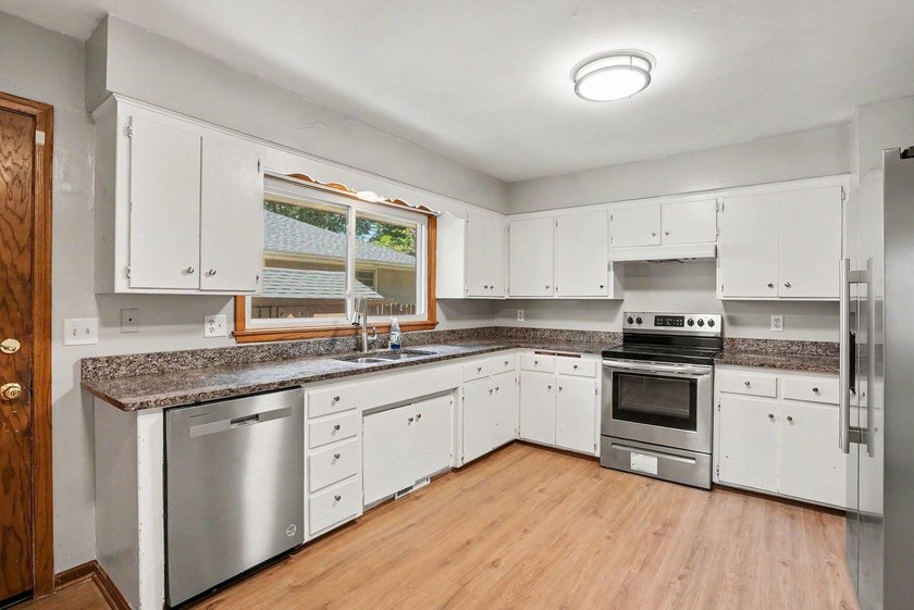 Welcome to this updated Rambler home located just minutes away - photo 6