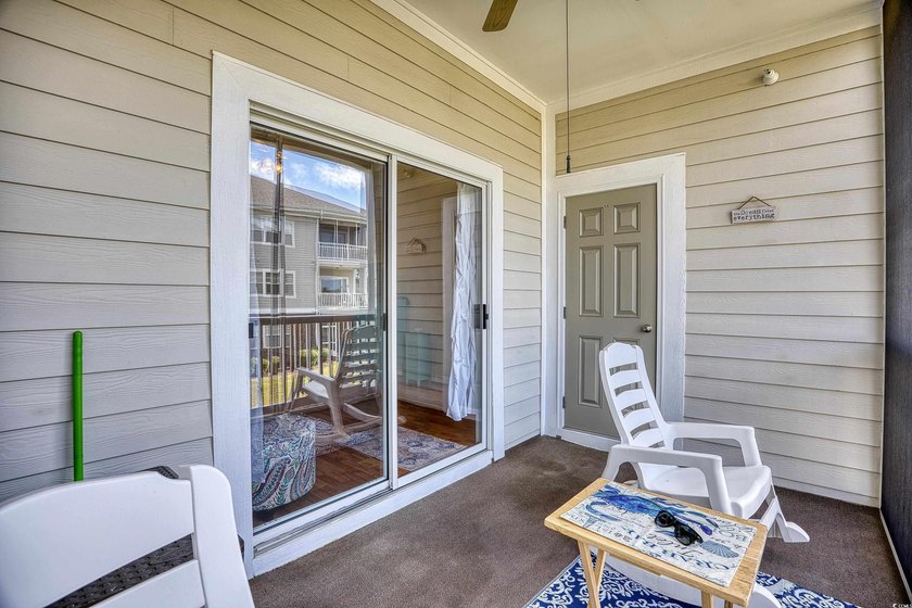 Breezy Carolina Living Step onto your private screened balcony - photo 20