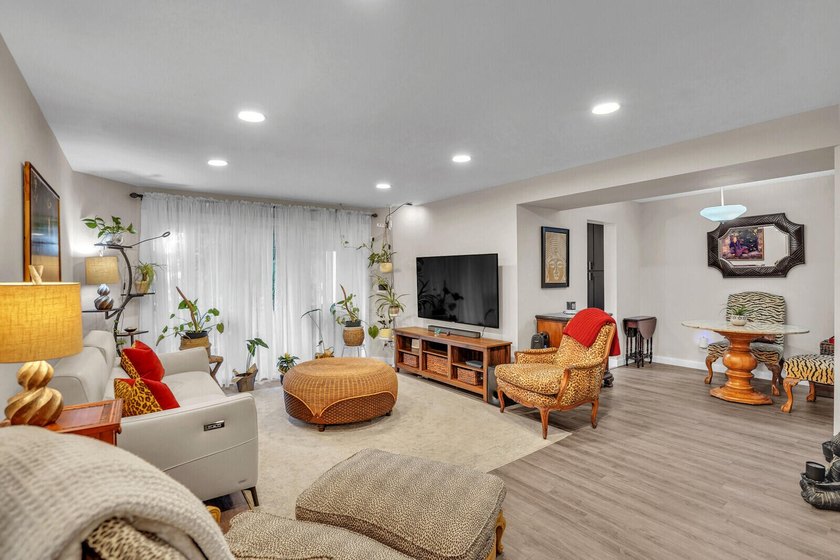 Move in ready 1st FLOOR condo in the desirable 55+ community of - photo 2