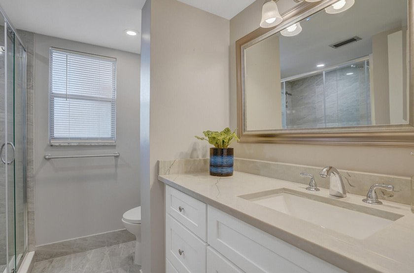 Move in ready 1st FLOOR condo in the desirable 55+ community of - photo 7