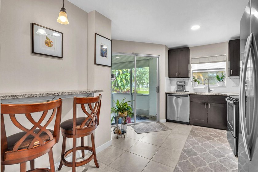 Move in ready 1st FLOOR condo in the desirable 55+ community of - photo 8