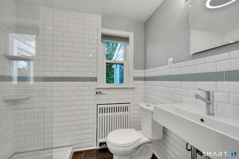 Beautifully updated and deceptively spacious, this move-in ready - photo 15