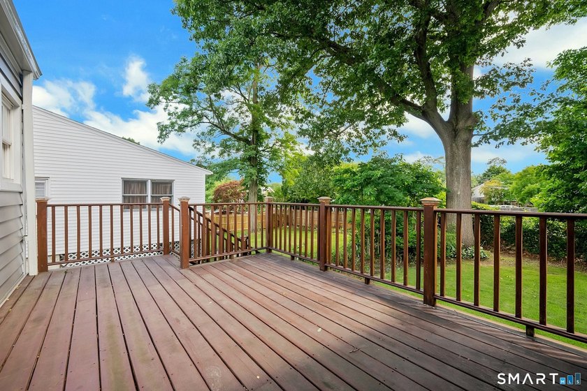Beautifully updated and deceptively spacious, this move-in ready - photo 25